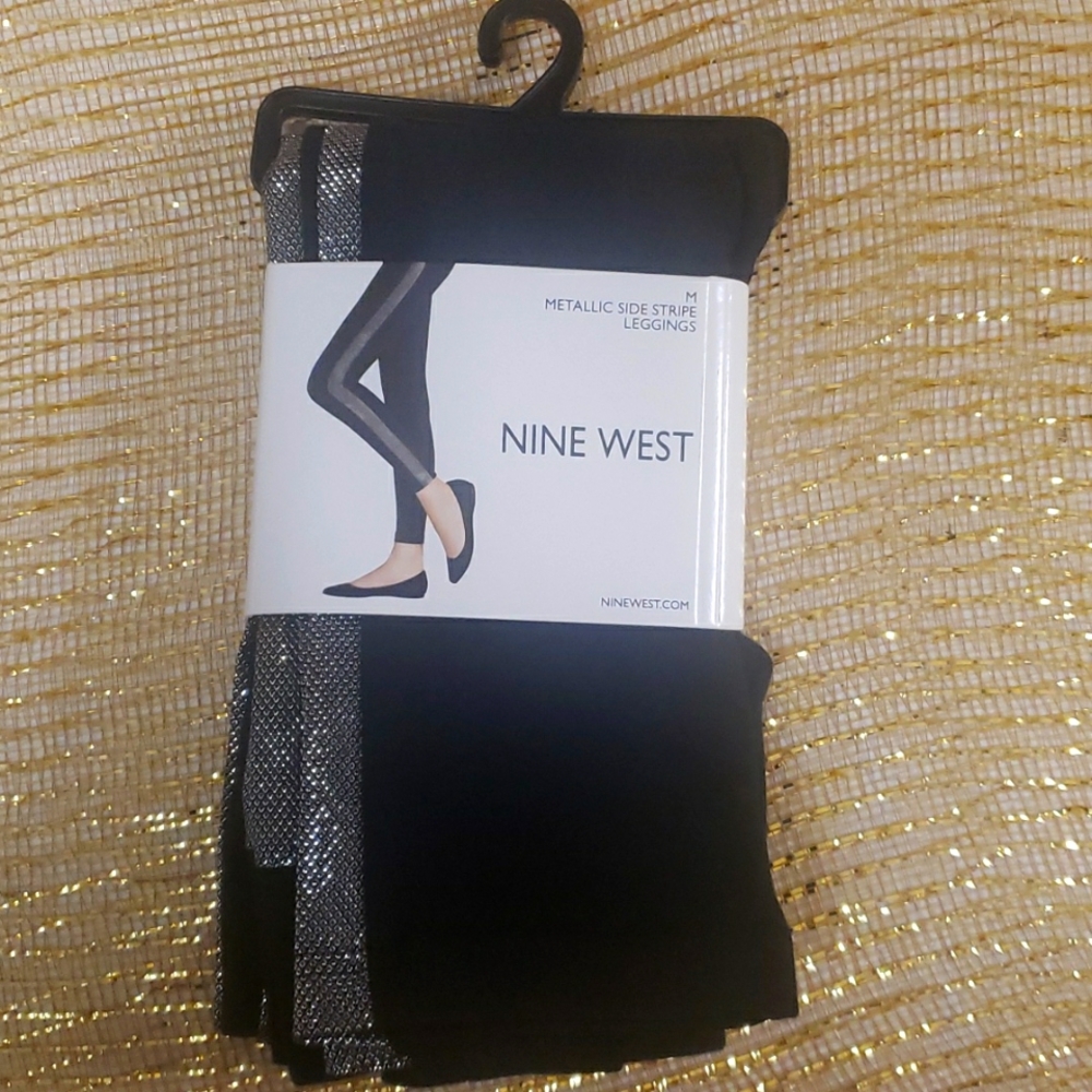 NWT. ..Nine West Womens Leggings. Black w/ Metallic Side stripes..Size M